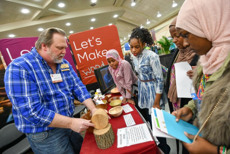 Attendees at American Craft Made Baltimore learn about wood turning Max Franz Photography