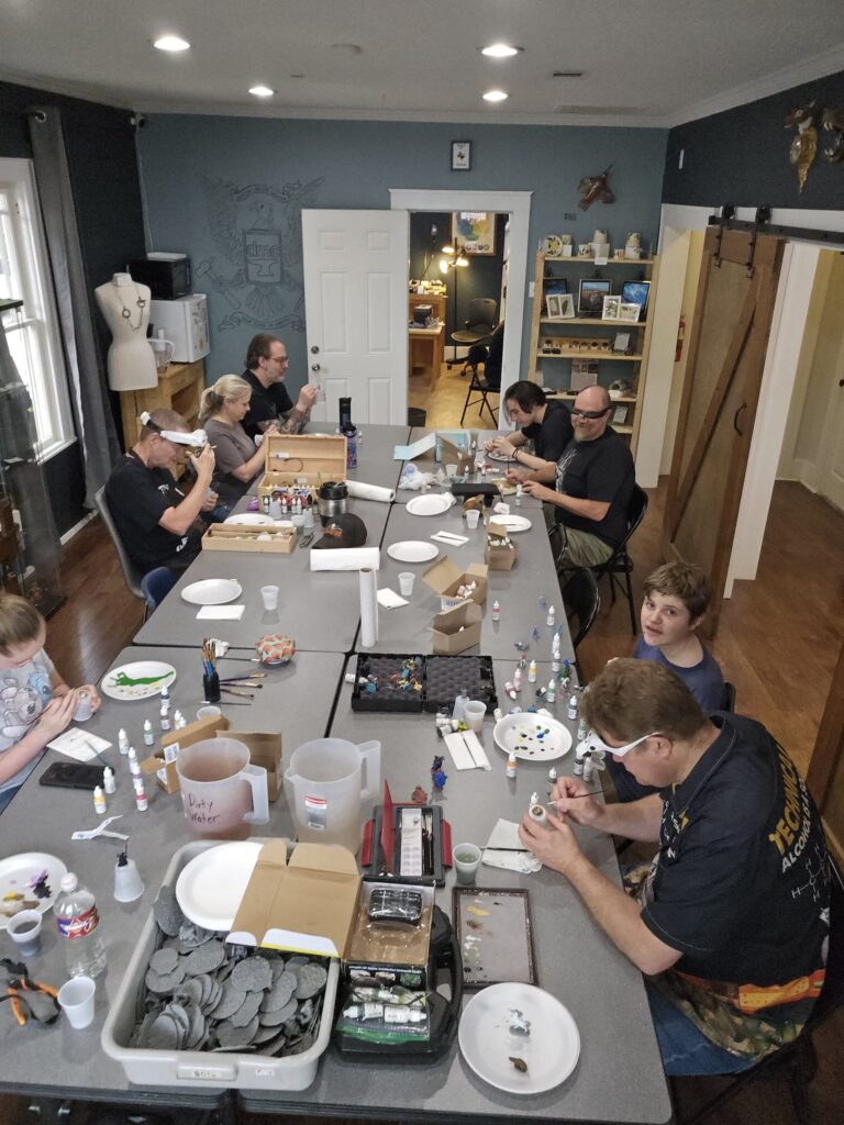 Miniature painting club. Denton Maker Center staff