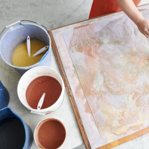 Artist Diana Al-Hadid creates background washes with pulp paint. Murray Hall