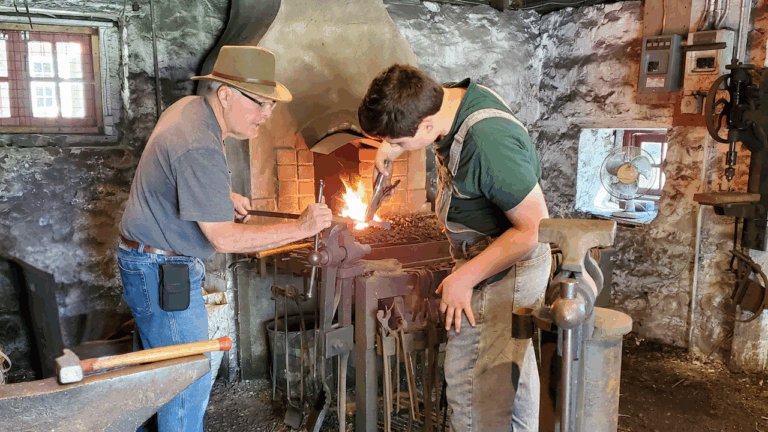 Blacksmith demonstrations in the forge. Red Mill Museum Village