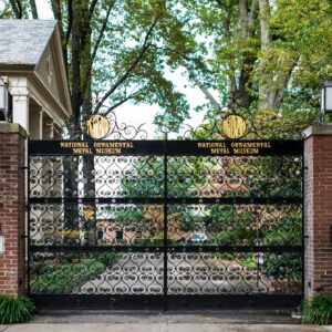 The entrance to the current Museum features our 10th anniversary gates. The gates incorporate different features made by metalsmiths from across the world. Metal Museum