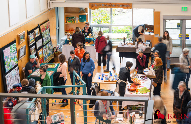 Community members and visitors browse at BARN's annual Holiday Bazaar, an event showcasing work by BARN members. BARN/Abby Wyatt