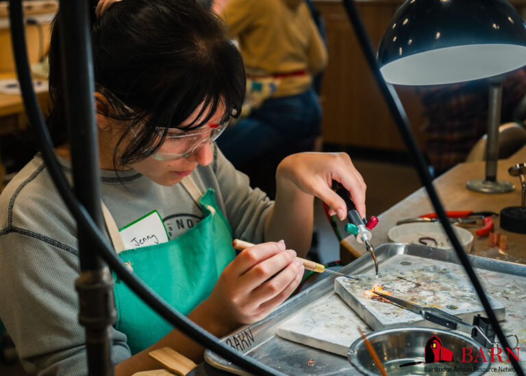 A student in BARN's Jewelry & Fine Metals Studio practices soldering skills. BARN/Abby Wyatt