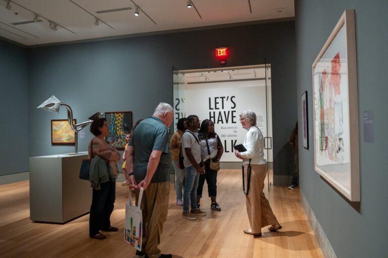 Visitors enjoying a docent-led tour. Victor Johnson / The Columbia Museum of Art