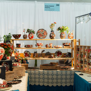 Image of a booth from The Potters Market at The Mint Museum, 2024. Artist: Trista Hudzik. The Mint Museum