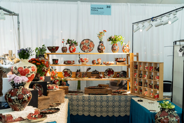 Image of a booth from The Potters Market at The Mint Museum, 2024. Artist: Trista Hudzik. The Mint Museum