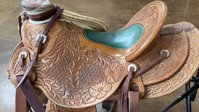 A close up of the hand carved patterns on a saddle made and designed by Clay Nicholas, a saddler maker from Bear River, Wyoming. A close up of the hand carved patterns on a saddle made and designed by Clay Nicholas, a saddler maker from Bear River, Wyoming. Emma George