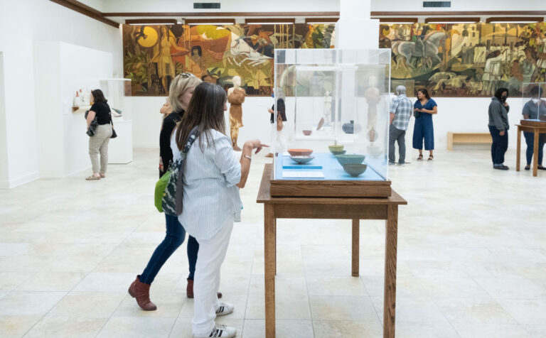 Visitors explore "Breaking Ground: Women in California Clay" at AMOCA. Photo credit: AMOCA