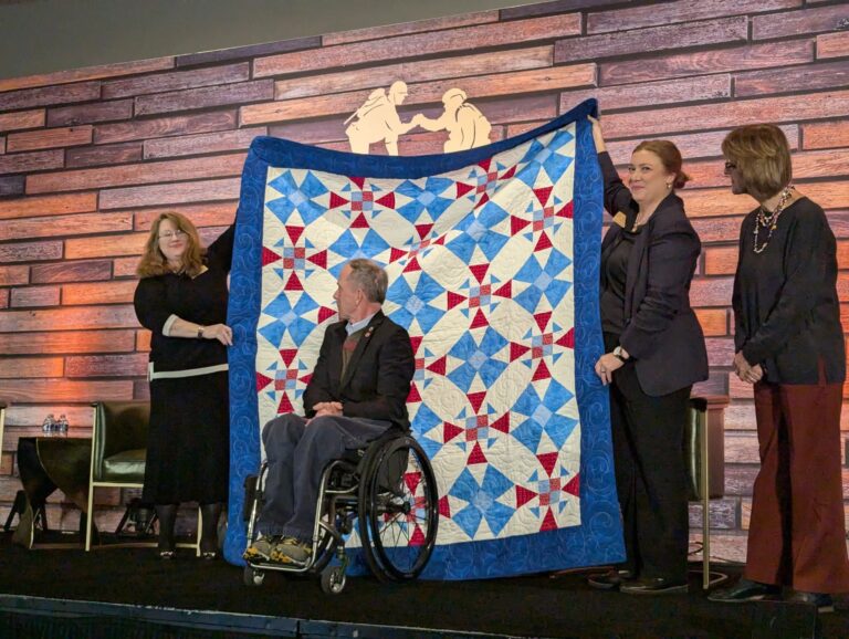 Dr. Rory Cooper receives his Quilt of Valor at the AUSA meeting in Washington D.C. in 2024. Kimberly Millay