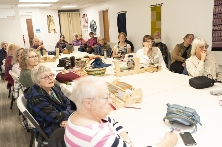 Fiber Community learning about Chimayo style Rio Grande tapestry. Photo by Max Woltman