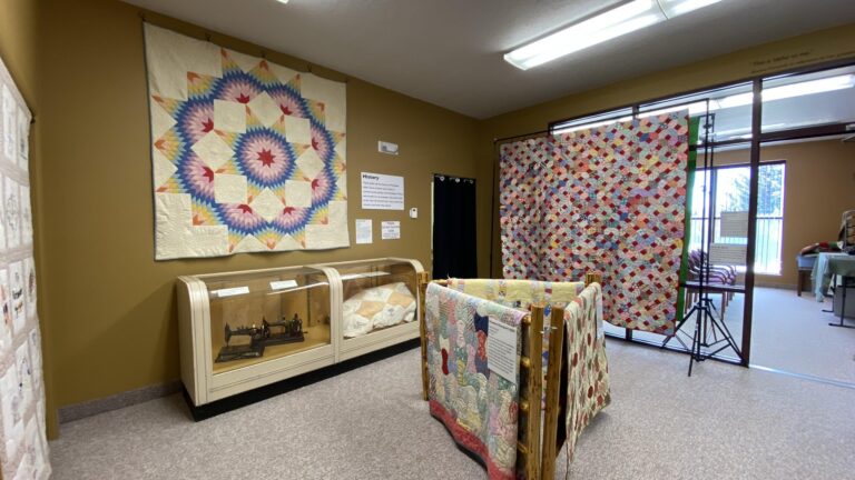 Finished-Quilt-Show-3 An image of several quilts displayed as part of the Southeast Idaho Quilt Show at the National Oregon/California Trail Center in Montpelier, Idaho. Emma George