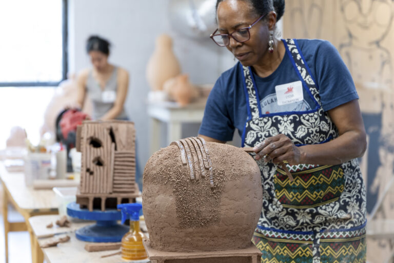 Featured ceramic artist Lydia Thompson demonstrates crafting a piece from her "Mounds" series. Roy Im
