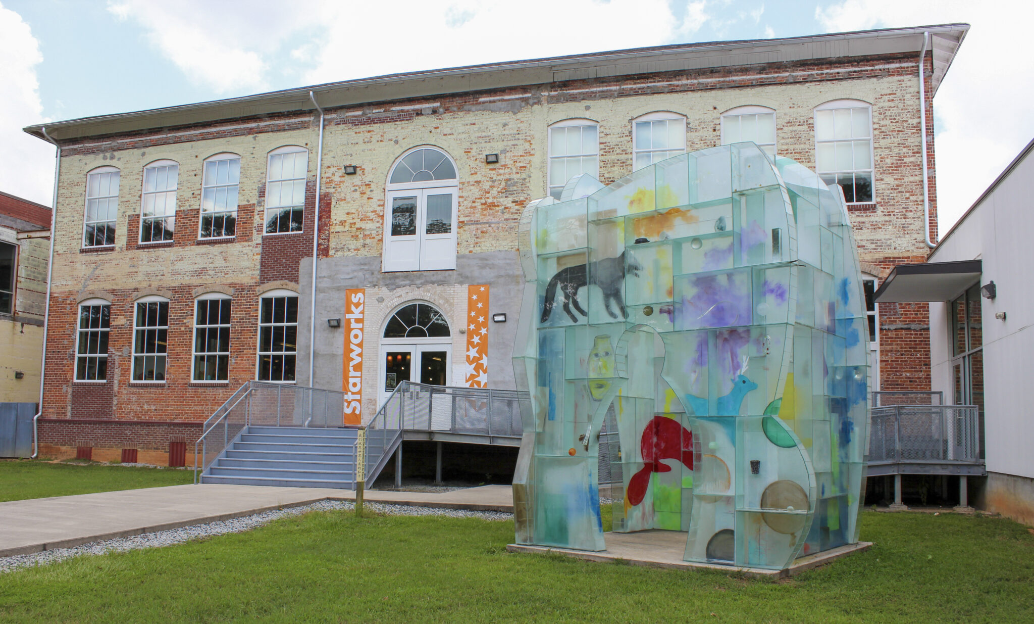 Therman Statom's Glass House Sculpture stands out front of the School House Gallery at Starworks. Claire Sellers