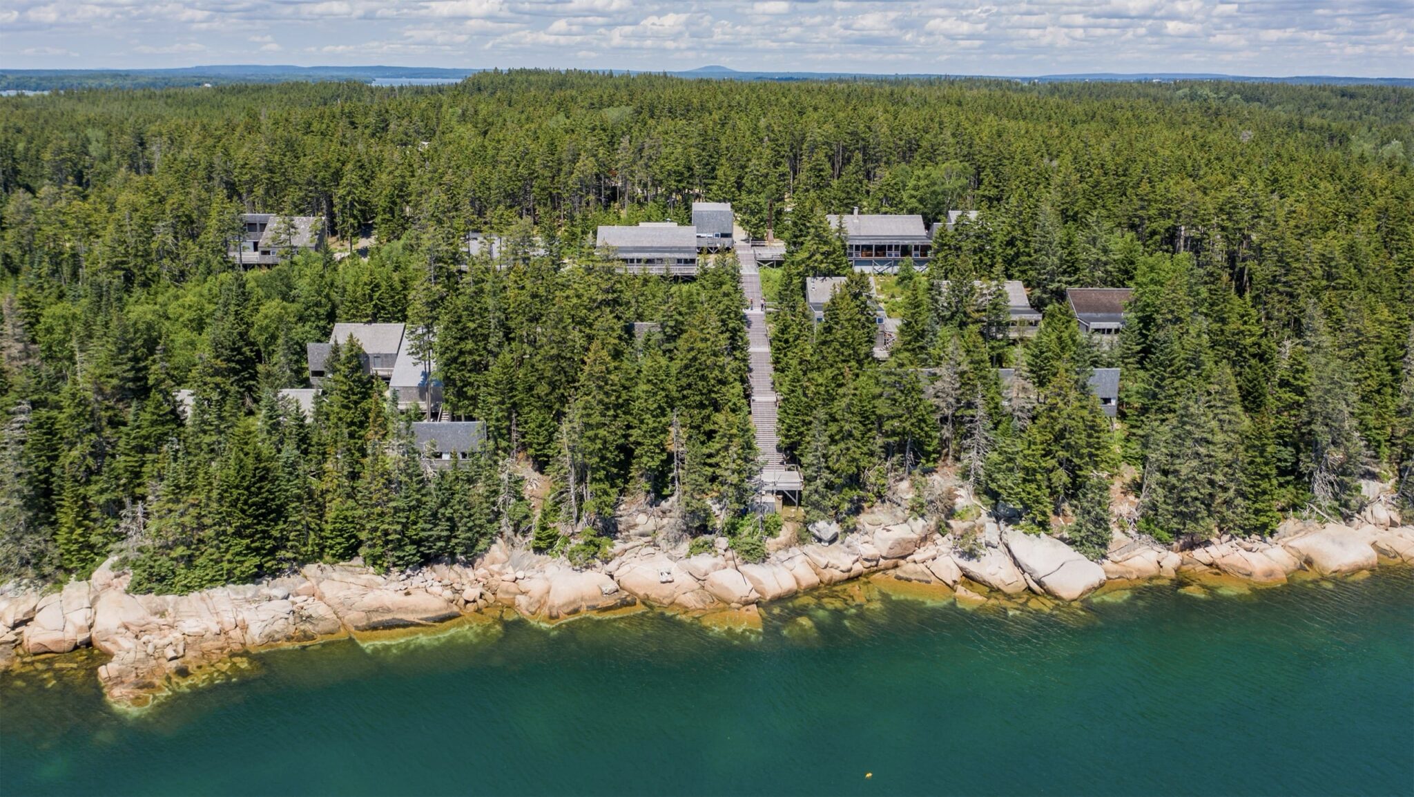 Aerial view of the Haystack campus. Photo courtesy of OPAL Architecture / Research / Design.