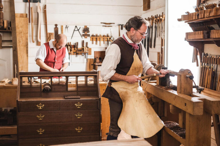 Master and journeyman Carpenters in the Anthony Hay Cabinet Shop in the Historic Area of Colonial Williamsburg. The Colonial Williamsburg Foundation
