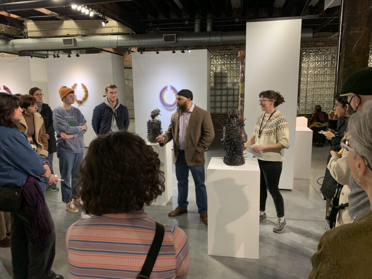 Belger Crane Yard Gallery: Sharif Bey speaks to attendees of his solo exhibition Belger Crane Yard Gallery: Sharif Bey speaks to attendees of his solo exhibition. Belger Arts