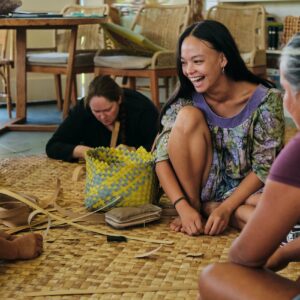 Keanahala weaver Lise Michelle Sugitan Childers repairing a moena lauhala (pandanus leaf mat). Blake Abes