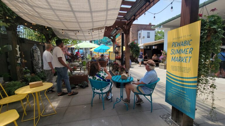 Visitors enjoy the Pewabic Courtyard during the Summer Market Visitors enjoy the Pewabic Courtyard during the Summer Market. Pewabic Pottery, Photographer: Amanda Rogers