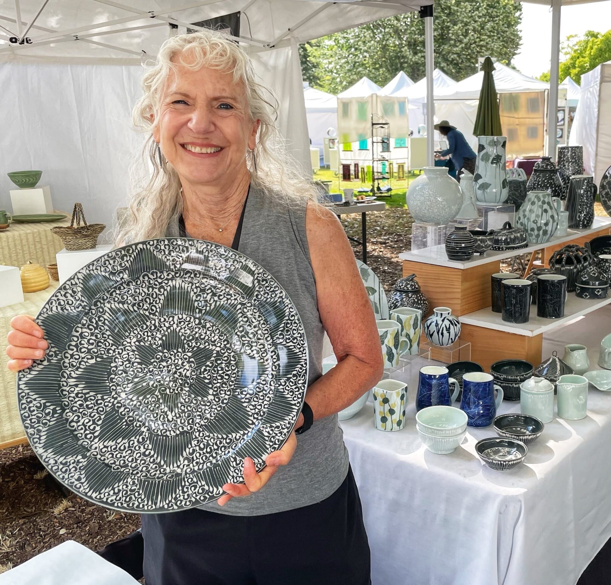 Susie Rubenstein displays her high fired porcelain table ware. She is based in San Juan Capistrano, California. Photo by Ren Lee