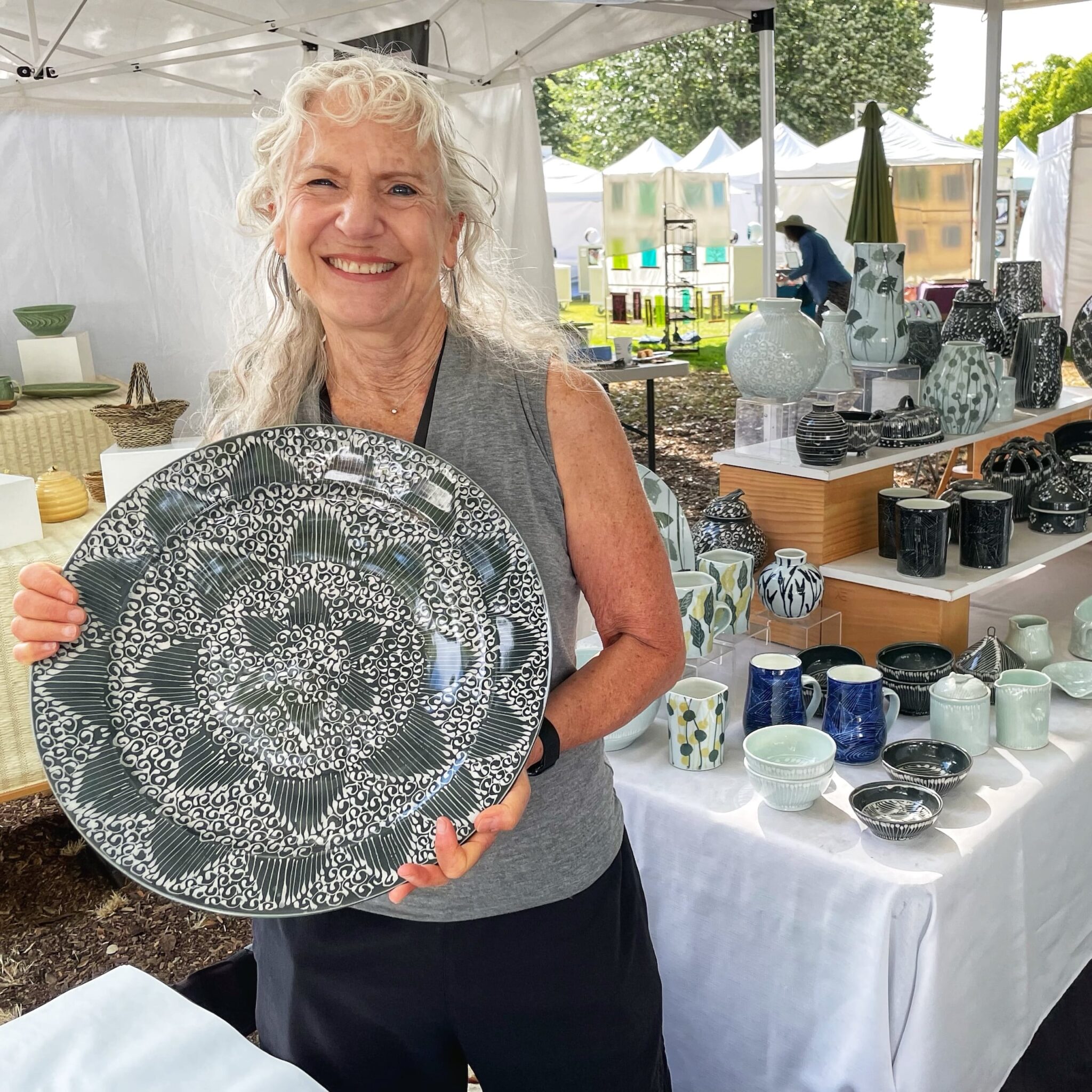 Susie Rubenstein displays her high fired porcelain table ware. She is based in San Juan Capistrano, California. Photo by Ren Lee