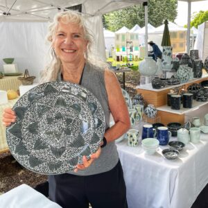 Susie Rubenstein displays her high fired porcelain table ware. She is based in San Juan Capistrano, California. Photo by Ren Lee