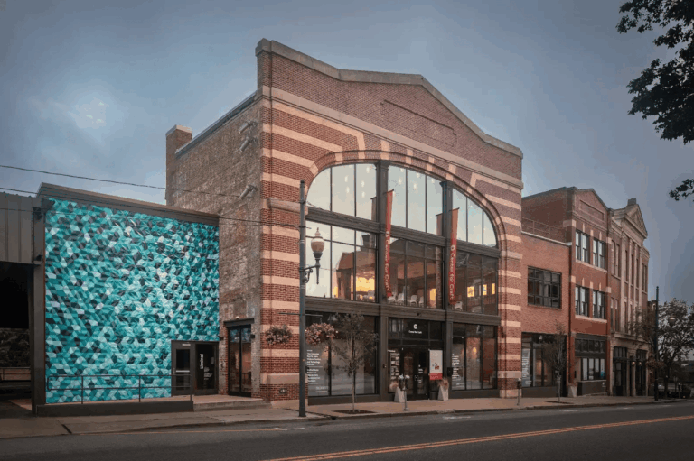 Building Exterior - South to North view from across Broadway St. Gabe Swinney, Swinney Creative