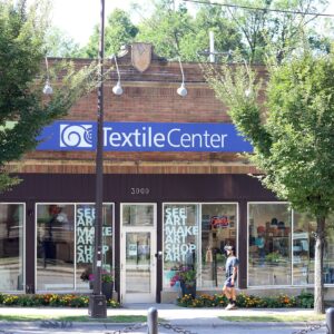 Textile Center is a national center for fiber art, free and open to the public. Situated near the confluence of Minneapolis and St. Paul, it is located in the Prospect Park neighborhood, directly across from the Prospect Park Station on the METRO Green Line light rail. Textile Center