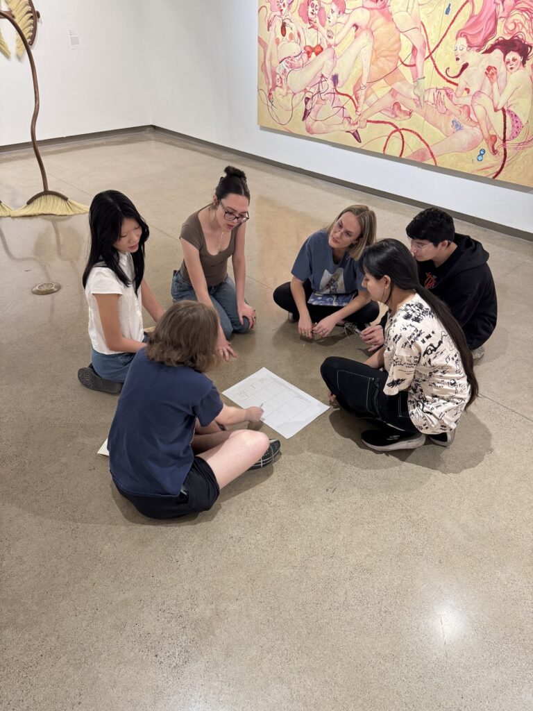 A small group of students studying in a gallery. A small group of students studying in a gallery. Credit: Carolyn Drake