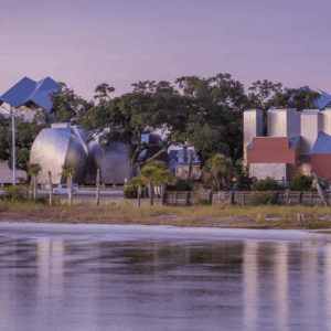Ohr-O'Keefe Museum of Art, photographed across the water of the Atlantic Ocean Gulf in Mississippi. Photo © A. Zahner Company.