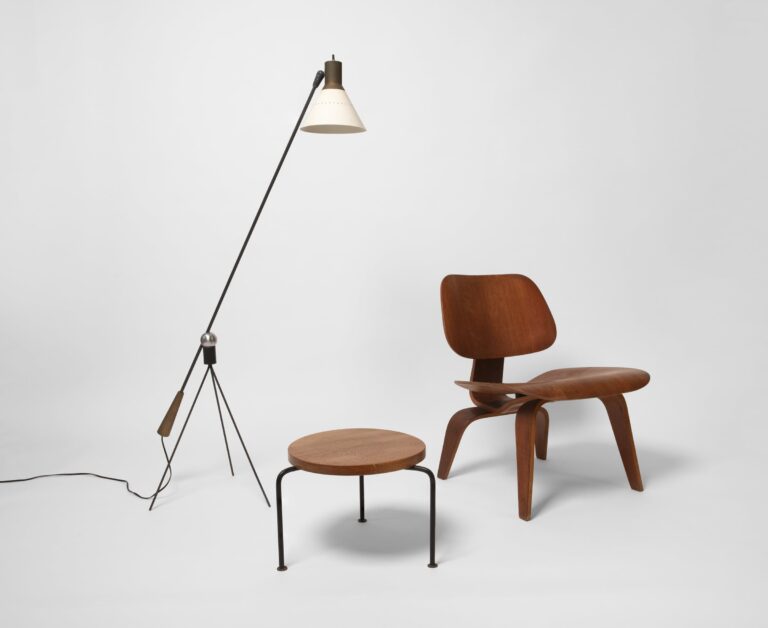 Inside the Design Center, On View Sep 6, 2025 - Apr 12, 2026: A vignette of mid-twentieth century interior, lighting, and furniture design as selected by Ilse Ruocco for her 1950 showroom. Guest Co-Curators Dave Hampton with Steve Aldana and Todd Pitman.(Photo courtesy of Ron Kerner). Charles O. Eames, LCW-Lounge Chairs Wood, California, U.S.A., 1950s. Plywood. Gift of JoAnn and Tim Tanzer, 2015-40-002, 2015-40-001. Floor Lamp designed by Gilbert A. Watrous, manufactured by Heifetz Co. New York, c. 1951. Lent by Todd, Carmen, and Finn, Pitman-Pauli.