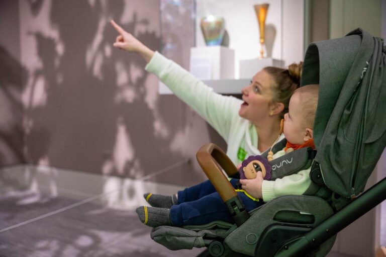Caregiver and child exploring the art during a stroller tour. Victor Johnson / The Columbia Museum of Art