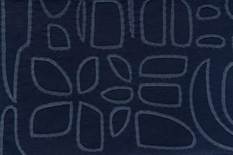 100% organic cotton fabric swatch using reverse applique techniques. Project Threadways