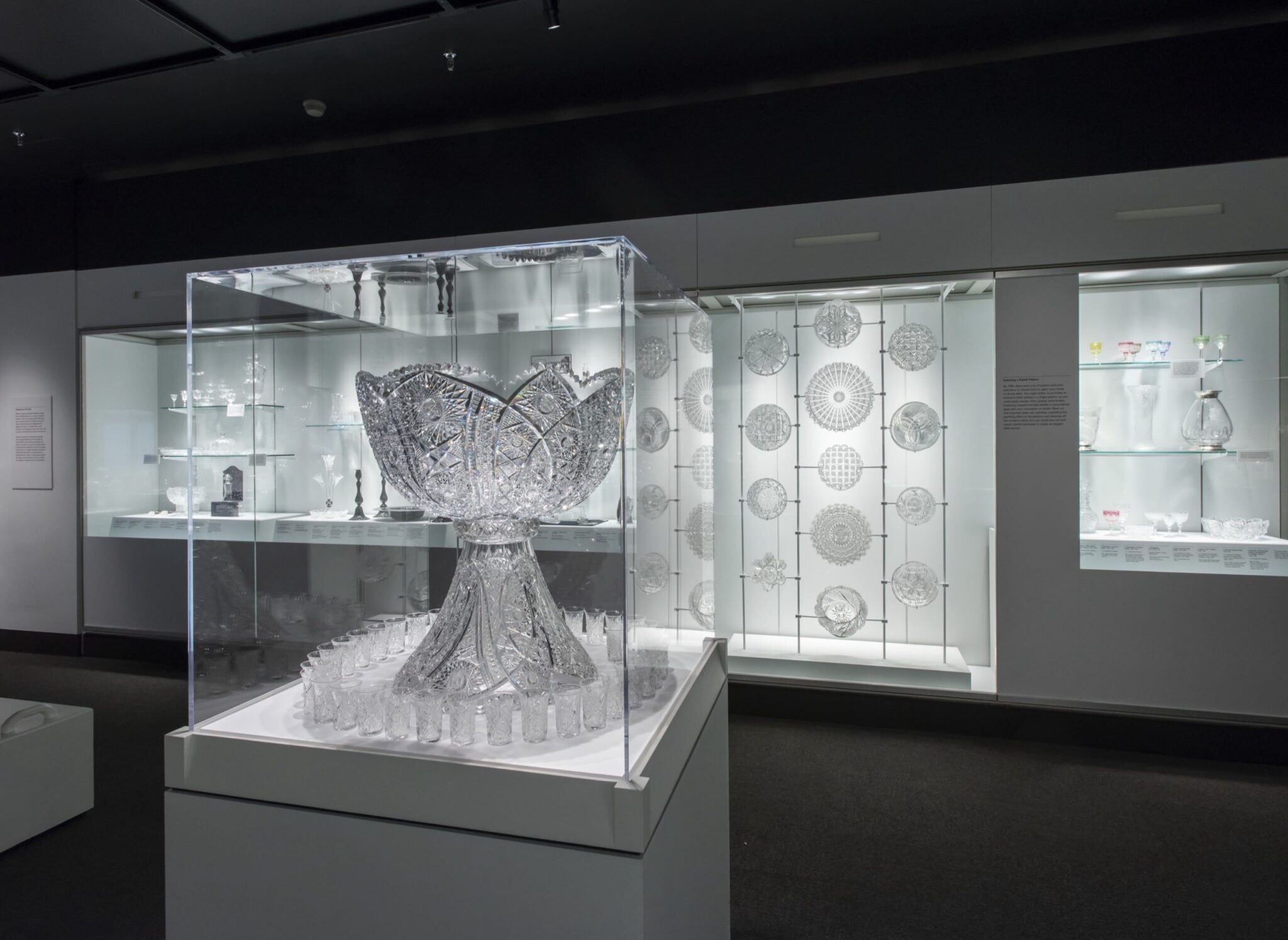 A stunning crystal punch bowl serves as an eye-catching centerpiece. Courtesy of Corning Museum of Glass