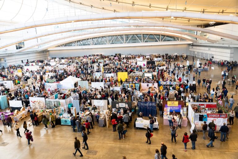 Aerial shot of maker booths and shoppers at Handmade Arcade's 2022 Holiday Market. Photo Credit: Kitoko Chargois, courtesy of Handmade Arcade