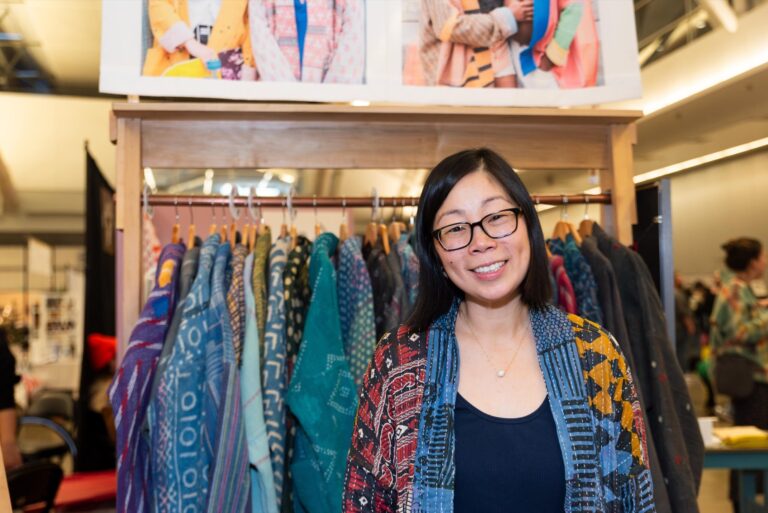 Maker Rona Chang with her Otto Finn products at Handmade Arcade's 2023 Holiday Market. Maker Pictured: Otto Finn (Photo Credit: Kitoko Chargois, courtesy of Handmade Arcade)