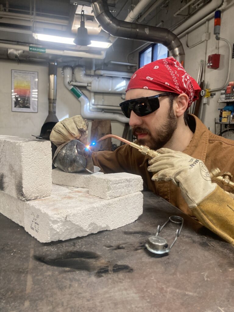 Student explores oxy-acetylene torch welding during a workshop on hollow-form steel sculpture with Lecturer and Metals Artist in Residence, Rhea Vedro Student explores oxy-acetylene torch welding during a workshop on hollow-form steel sculpture with Lecturer and Metals Artist in Residence, Rhea Vedro. Rhea Vedro