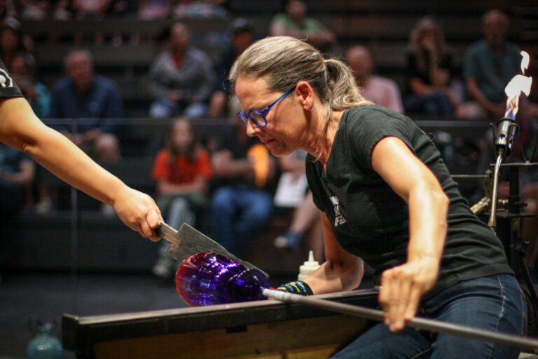 Artist and Hot Glass Team member Helen Tegeler demonstrates her craft in the Amphitheater Hot Shop. Courtesy of Corning Museum of Glass