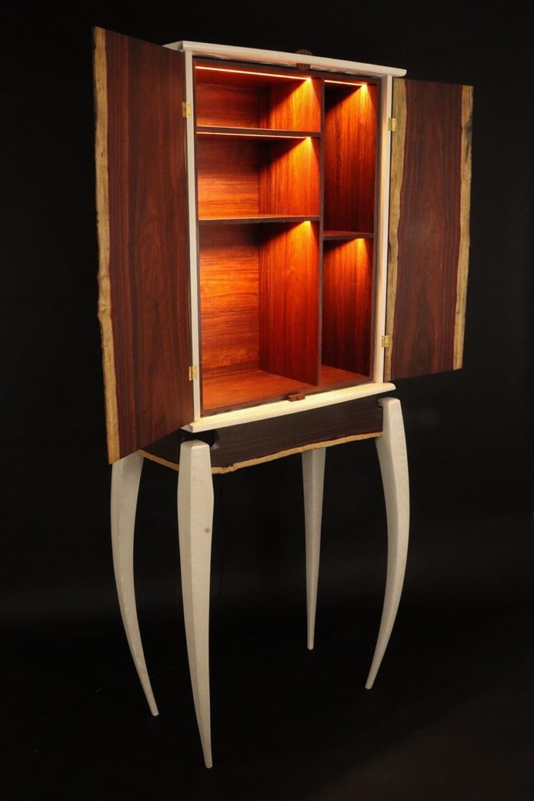 James Nelson, Nareau Liquor Cabinet, 2024, Granadillo, Bleached & Dyed Ash, 71”h x 27”w x16”d, Courtesy of the Artist James Nelson, Nareau Liquor Cabinet, 2024, Granadillo, Bleached & Dyed Ash, 71”h x 27”w x16”d, Courtesy of the Artist