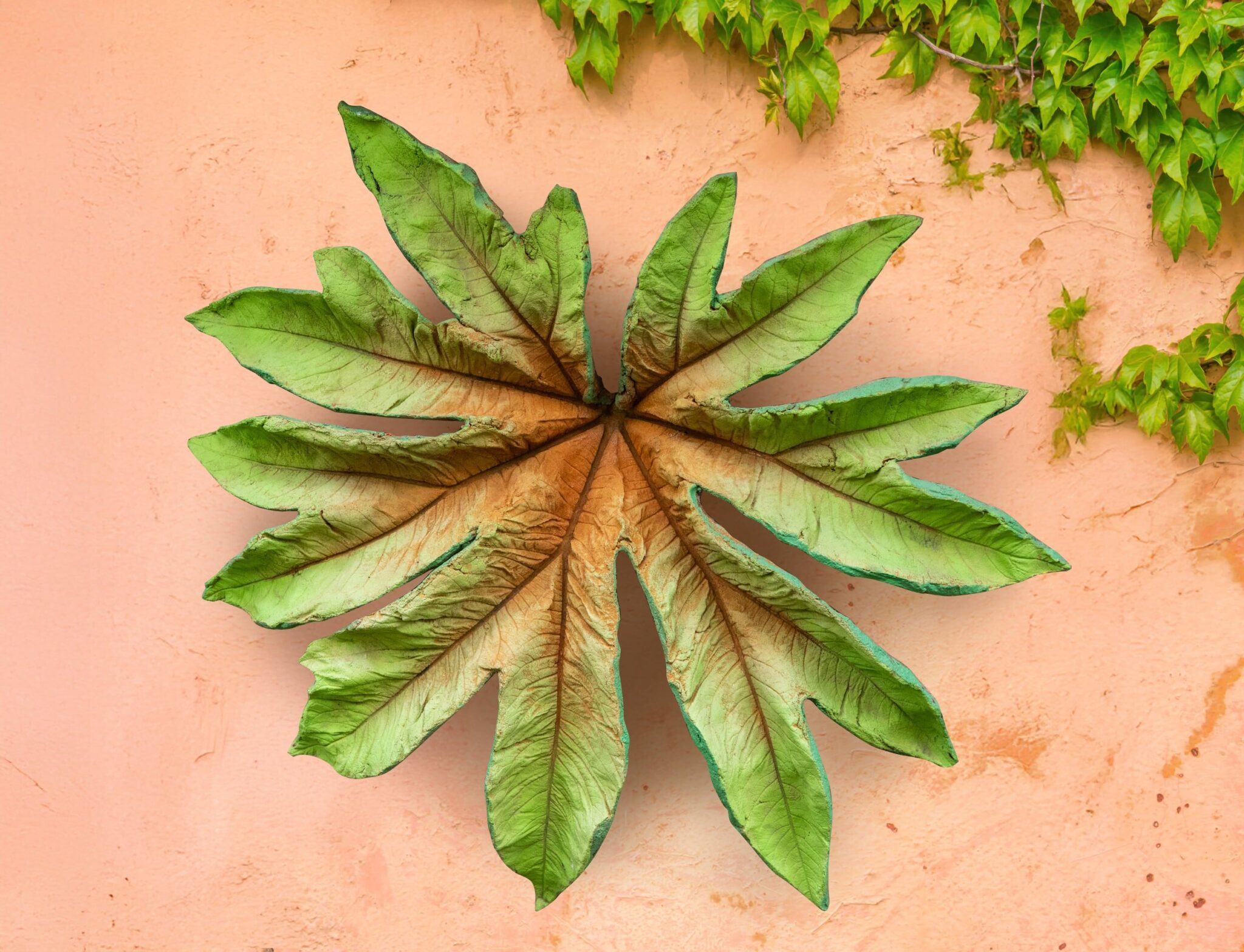 Large cast concrete Tetrapanax Leaf by David & George Lewis. Little and Lewis, The Last Tetrapanax, 2005, cast concrete, 43” sq. Private collection.