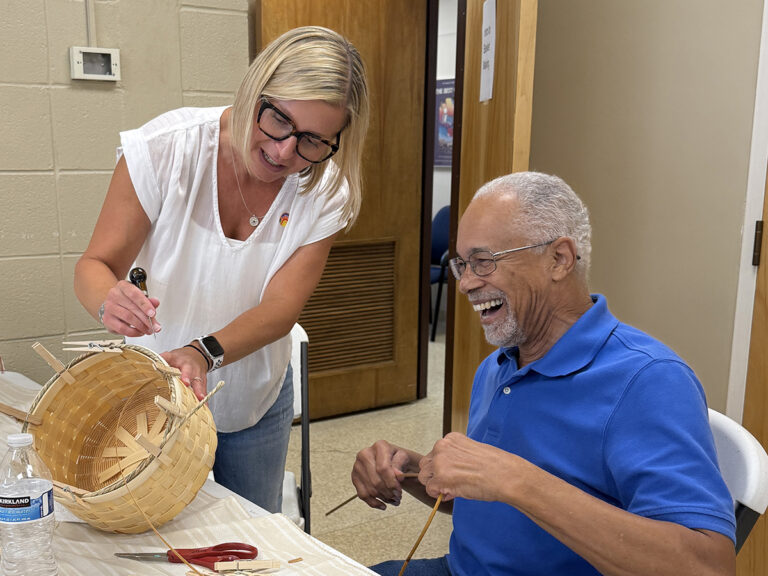 Board member Marvin Whistler learns basket weaving at the museum's annual adult summer camp. Ohio Craft Museum
