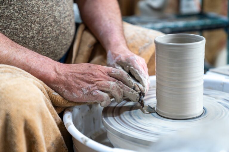 The hands of League clay artist Richard Roth at work. Windwood Productions, LLC