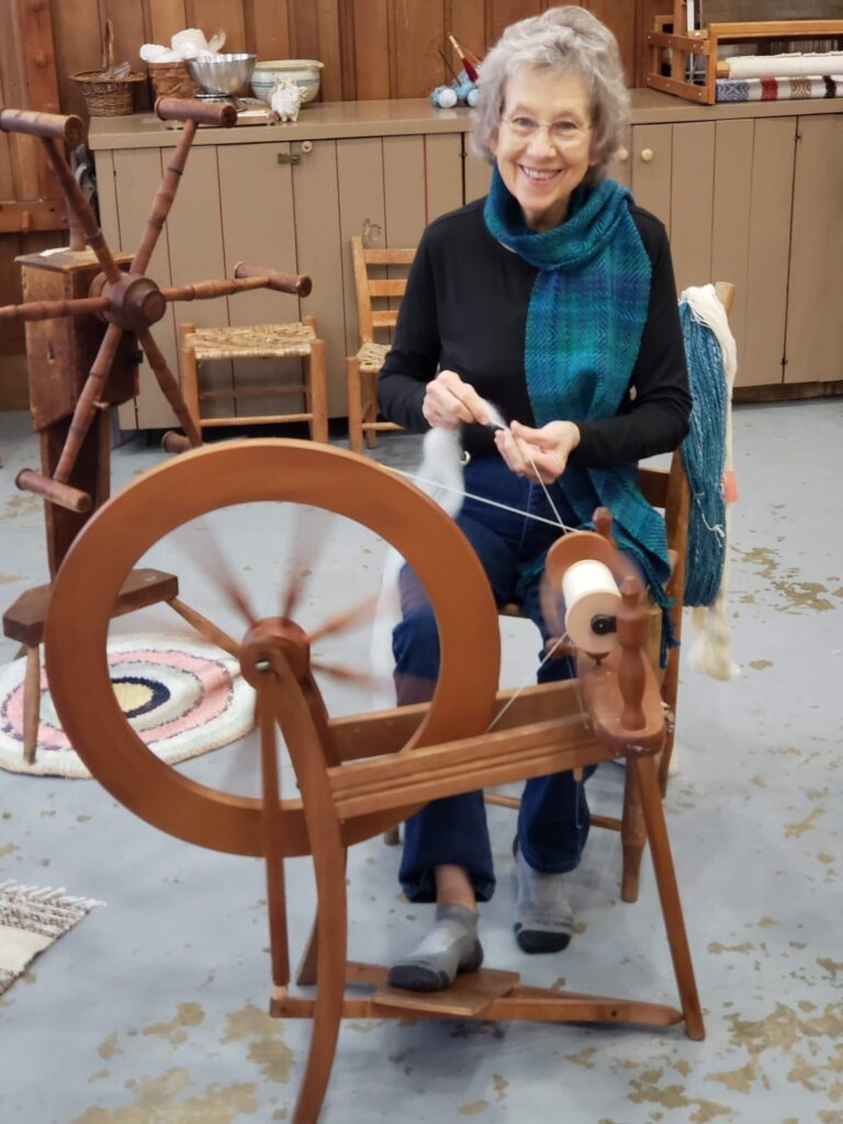 Master spinner Debbie Pringle greets visitors to the Fiber Arts Shop at the Ozark Folk Center State Park. Jeanette Larson