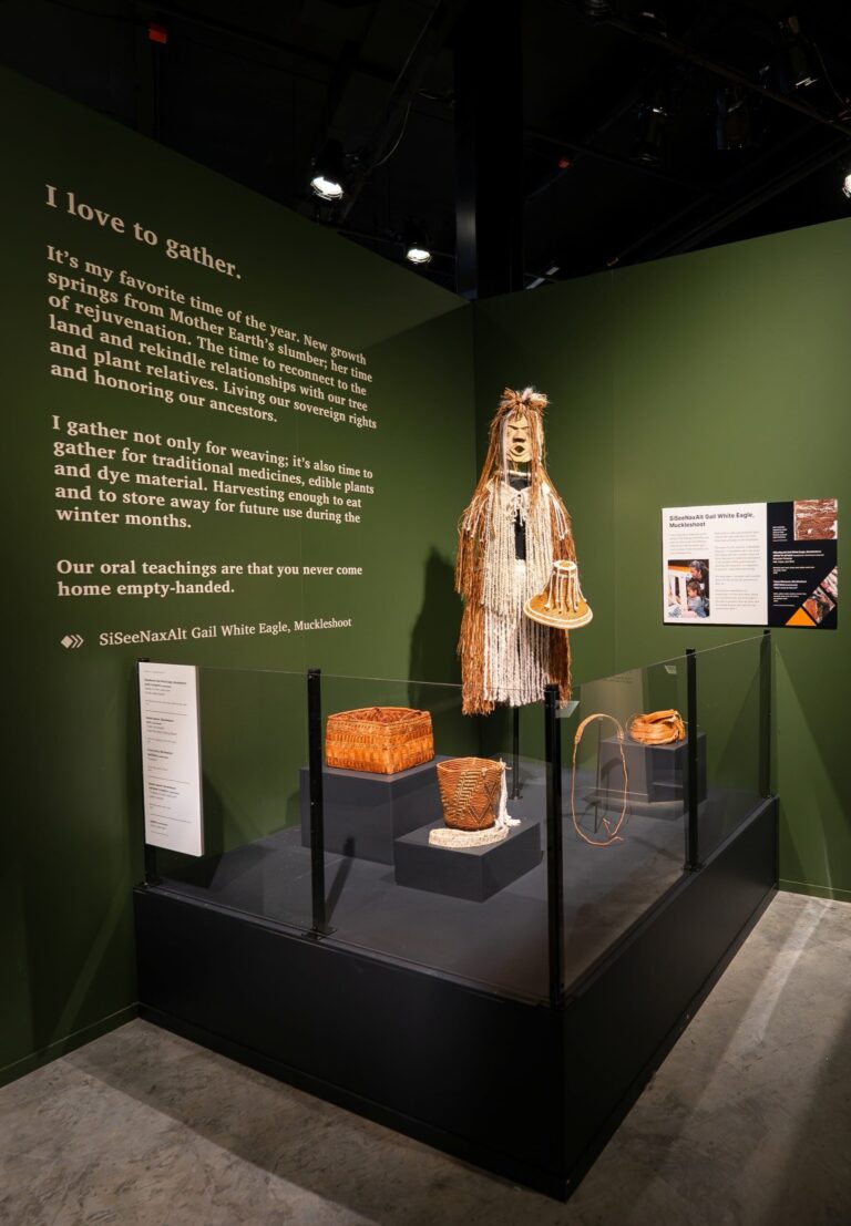 Shown center, Mountain Protector, 2025,SiSeeNaxAlt Gail White Eagle (Muckleshoot) featured in the Gathering Gallery. Chris Snyder/Burke Museum Shown center, Mountain Protector, 2025,SiSeeNaxAlt Gail White Eagle (Muckleshoot) featured in the Gathering Gallery. Chris Snyder/Burke Museum