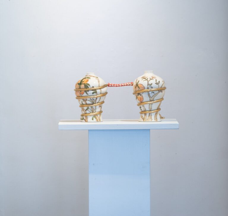 Jennifer Ling Datchuk, Take It Easy, 2023, Porcelain, bamboo finger trap, and gilded 10 x 7 x 7 in (each vase), 25.4 x 17.8 x 17.8 cm (each vase). Courtesy the artist and Ruiz-Healy Art, New York | San Antonio | Image by Yadira Silva Jennifer Ling Datchuk, Take It Easy, 2023, Porcelain, bamboo finger trap, and gilded 10 x 7 x 7 in (each vase), 25.4 x 17.8 x 17.8 cm (each vase). Courtesy the artist and Ruiz-Healy Art, New York | San Antonio | Image by Yadira Silva