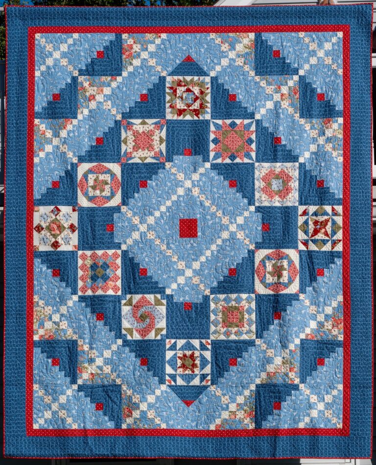 2026 Raffle Quilt, “Every Quilt Tells a Story". Michelle Lisa Giorla