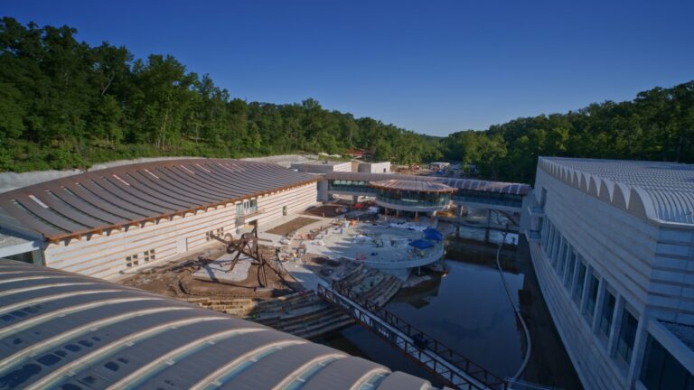 ​​Aerial view of Construction of Crystal Bridges Museum of Art Expansion. Photography by Edward C. Robison III, courtesy of Crystal Bridges Museum of Art.