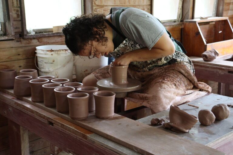 Student Making Mugs at the 2025 Pottery Retreat. Marguerite Schwarz Student Making Mugs at the 2025 Pottery Retreat. Marguerite Schwarz