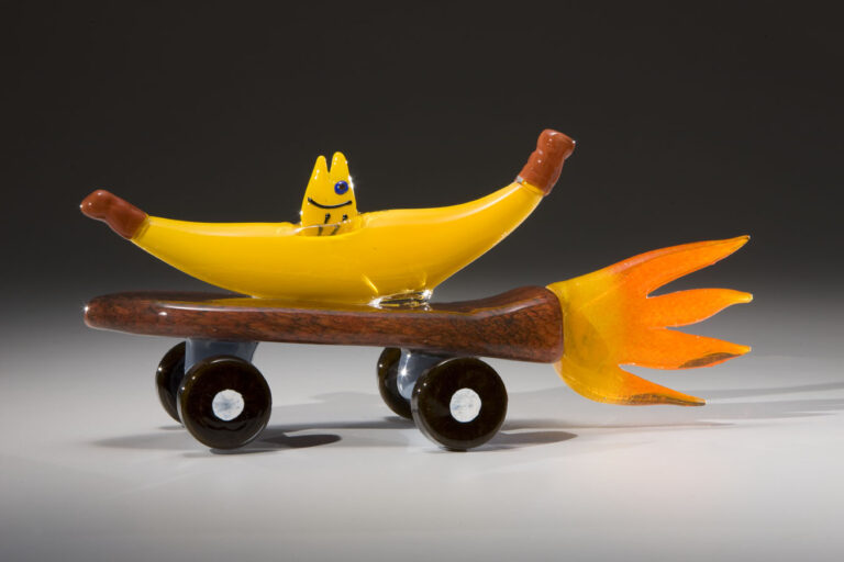 Banana Bam! Designed by Macay Fischer (age 8), made by Museum of Glass Hot Shop Team. Banana Bam!, 2007. Blown and hot-sculpted glass with applied bits; 7 x 15 1/2 x 6 inches. Collection of Museum of Glass, Tacoma, Washington. Sponsored by Republic Parking Northwest, Inc. Photo by Russell Johnson and Jeff Curtis.