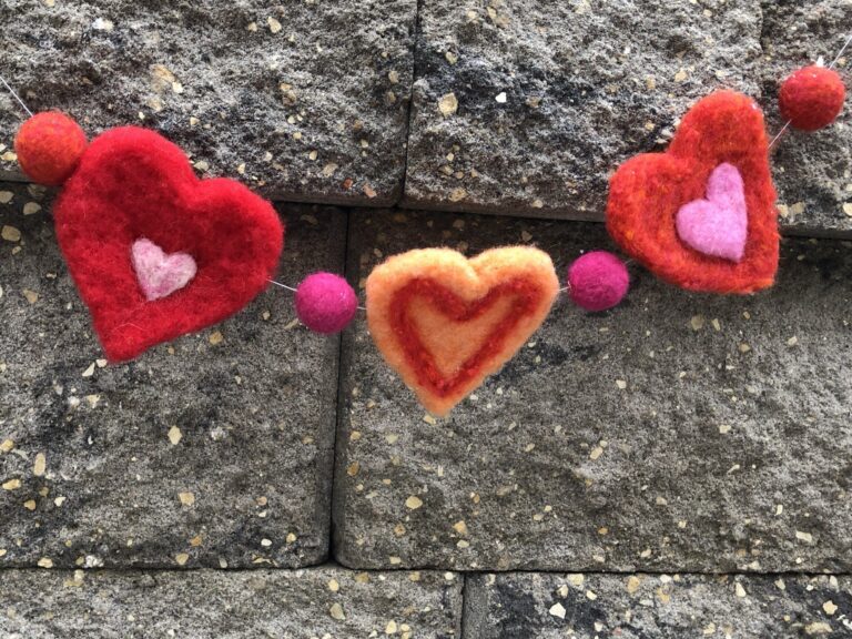 Felt hearts on a string. American Swedish Institute Felt hearts on a string. American Swedish Institute