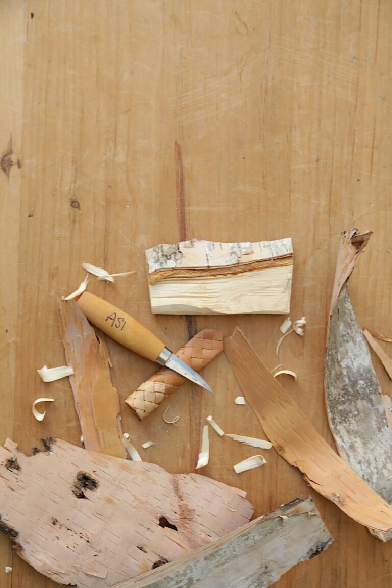 Carving tool and wood shavings. American Swedish Institute